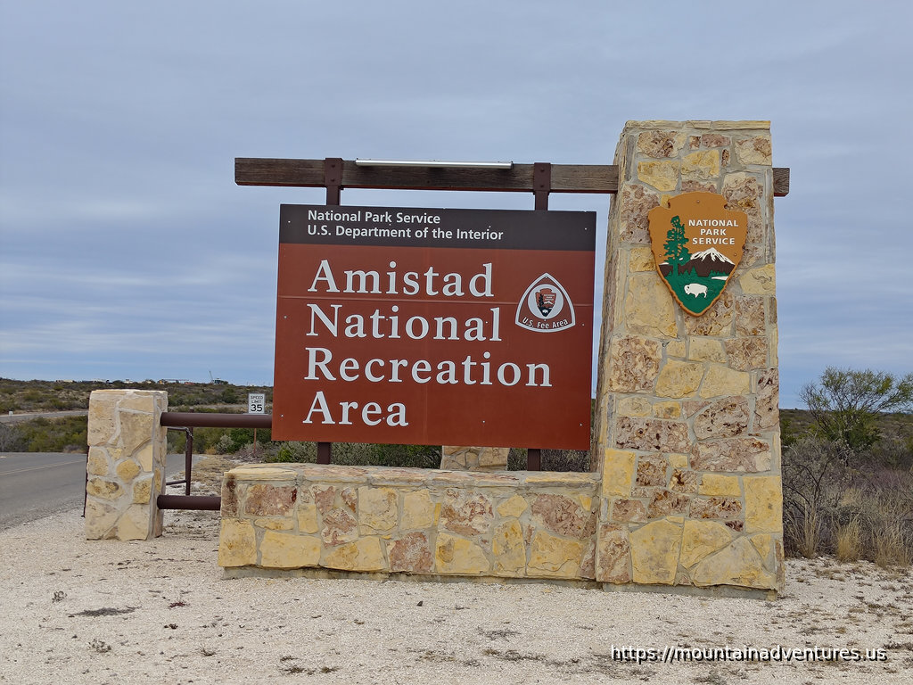 Amistad National Recreation Area Entrance Sign with Cloudy Skies