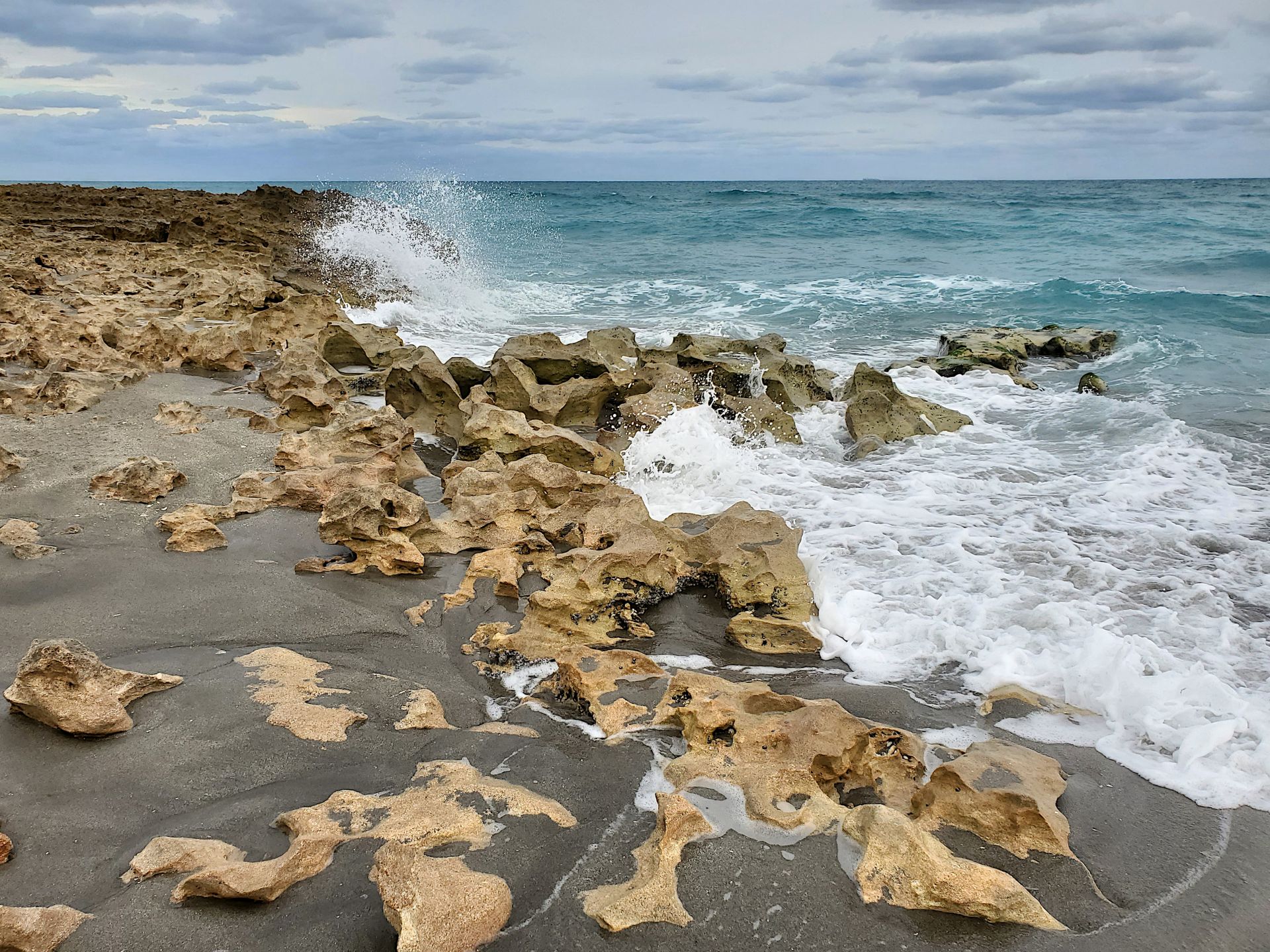 Wave Crashing Against the Rocks