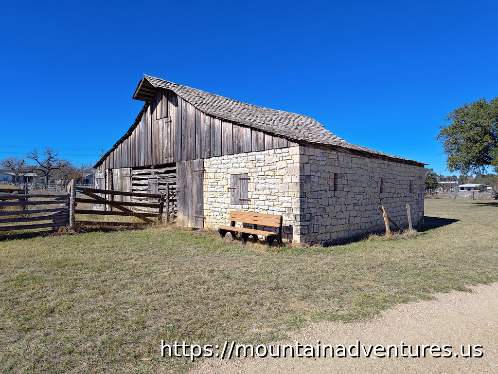 James Polk Johnson Stone and Wood Barn with Blue Sky