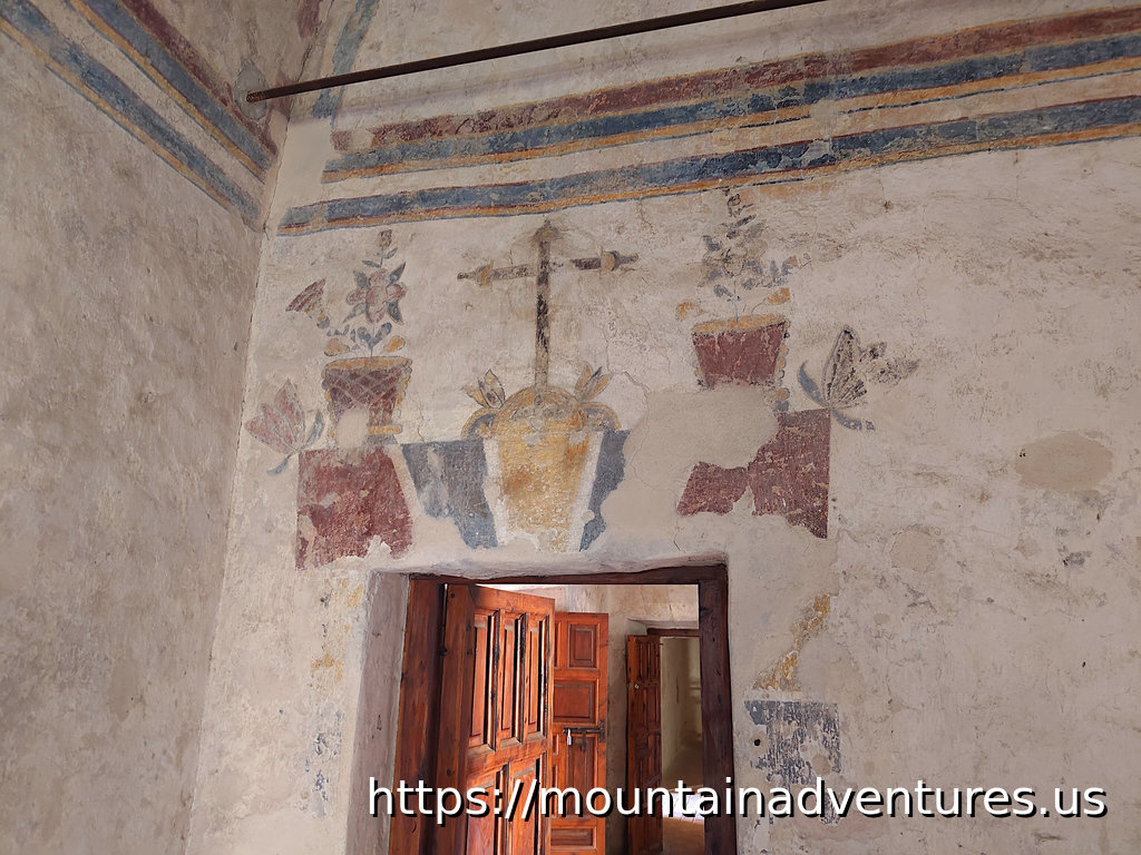 Frescos Decorating the walls with a Door