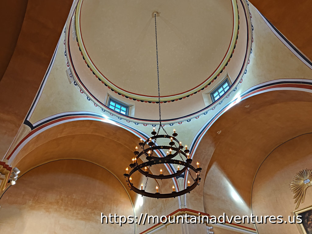 View of the dome with windows and a chandelier